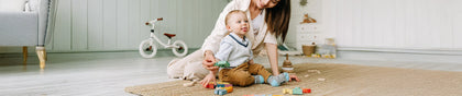 Personalised organic cotton blanket and Montessori busy board from Govinto UK